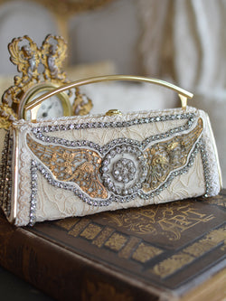 Hand Embroidered Silk Minaudiere with French Paste Medallion and Gilded Filigree Wings